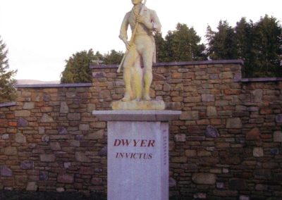 Michael Dwyer Statue in the Glen of Imaal -Man standing with a gun across his body